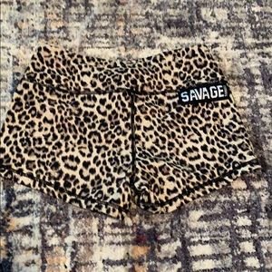 Savage barbell cheetah print shorts